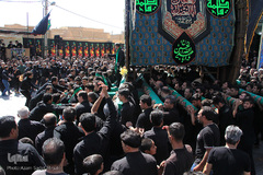 ⁨نخل‌گردانی در محله و حسینیه فهادان یزد⁩